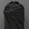 Black colored fabric made with Rayon from bamboo, cotton, and spandex.