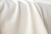 White colored french terry fabric from cotton and spandex.