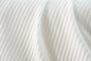 White colored ribbed knit fabric made from polyester and rayon.