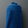 Blue colored anti-pill fleece fabric made from 100 percent recycled polyester.
